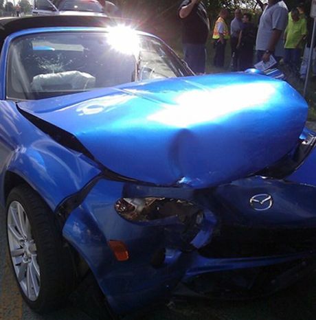 blue car wrecked in a speeding collision accident, the lawyers are needed for victim's compensation