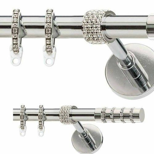 particolare di un bastone per tende con dei brillanti