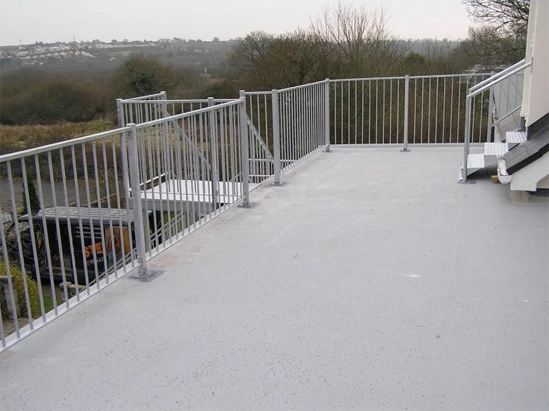 Steel balcony and staircase on flat roof