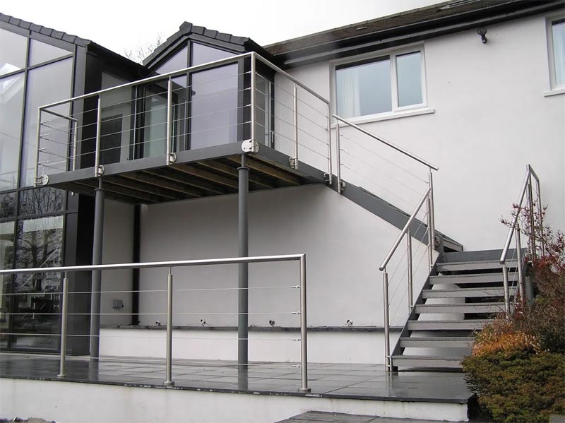 Steel balcony and staircase on multi story house