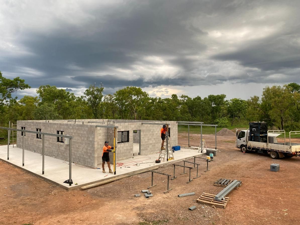 A Truck is Parked in Front of a Building Under Construction — New Home Builders in Yarrawonga, NT