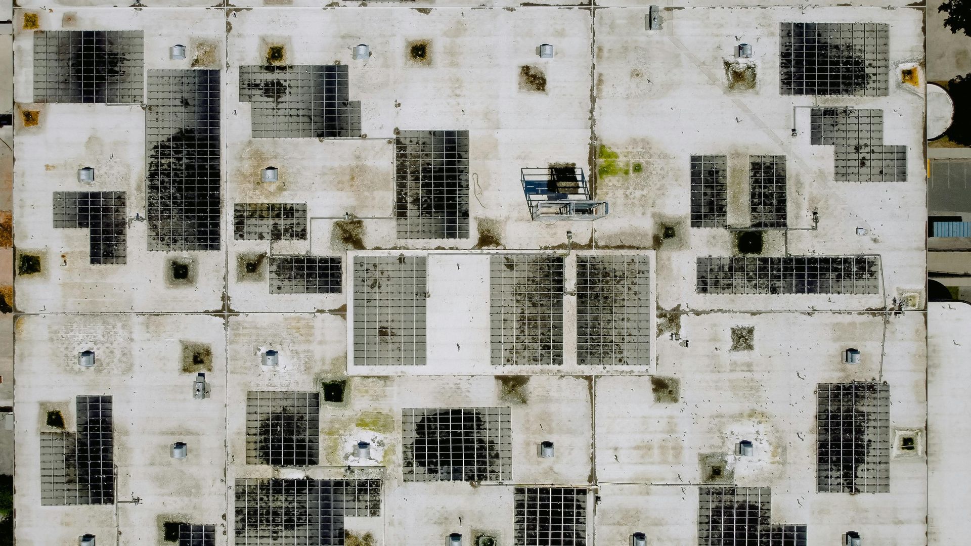An aerial view of a building with a lot of windows
