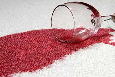Glass of red wine spilt on carpet — Carpet in Chubbuck, ID