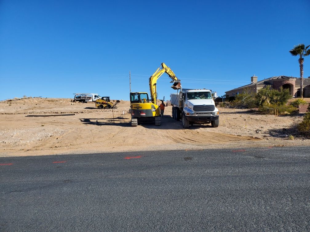 Backhoe And Truck Operating — Kingman, AZ — Old Trails Demolition