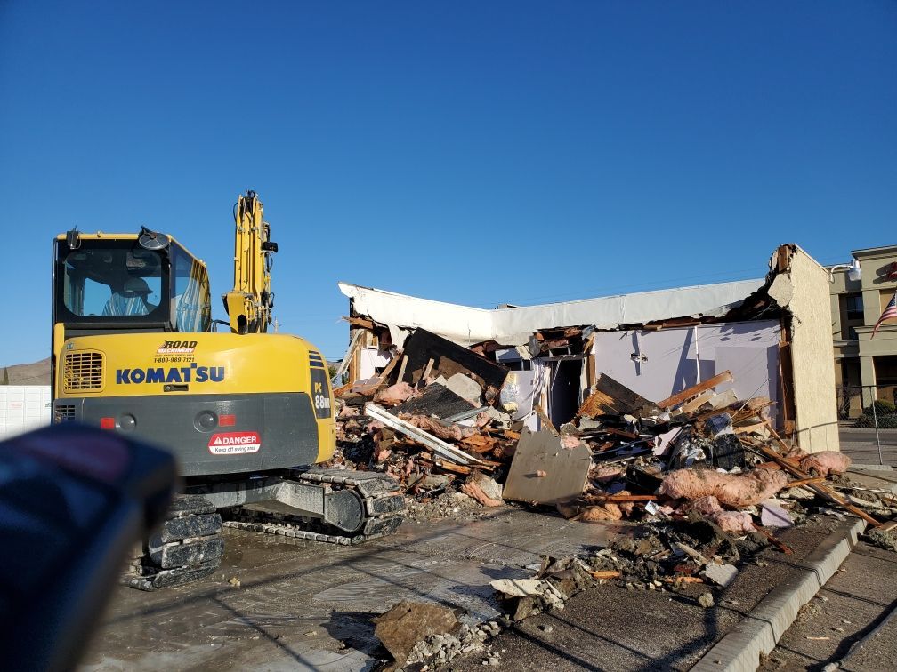 Backhoe Demolishing — Kingman, AZ — Old Trails Demolition