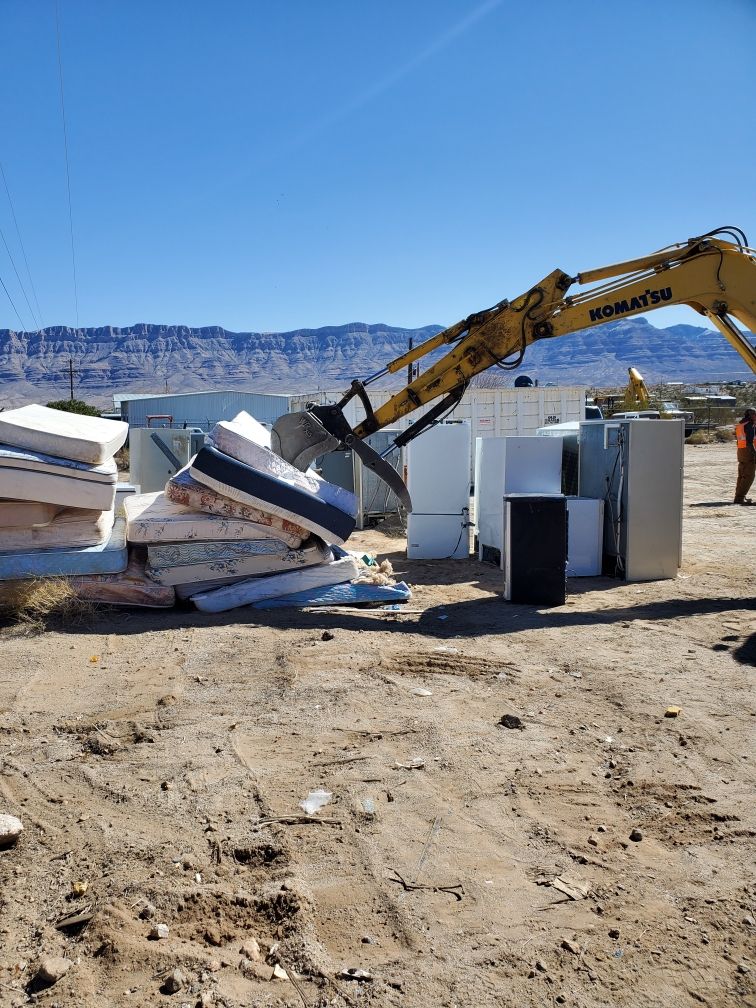 Backhoe Destroying The Scrap — Kingman, AZ — Old Trails Demolition