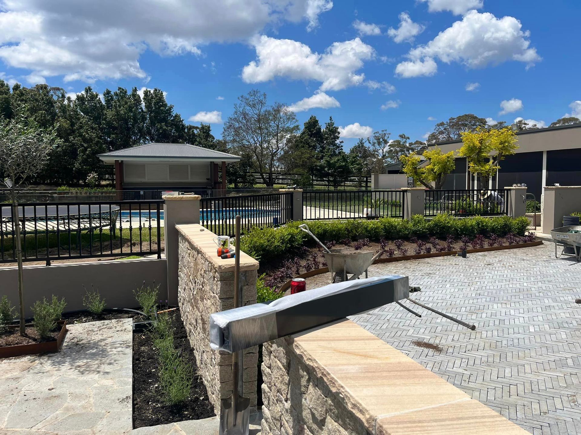 Fenced Driveway with a House and Trees — Penrith, NSW — C&C Wrought Iron