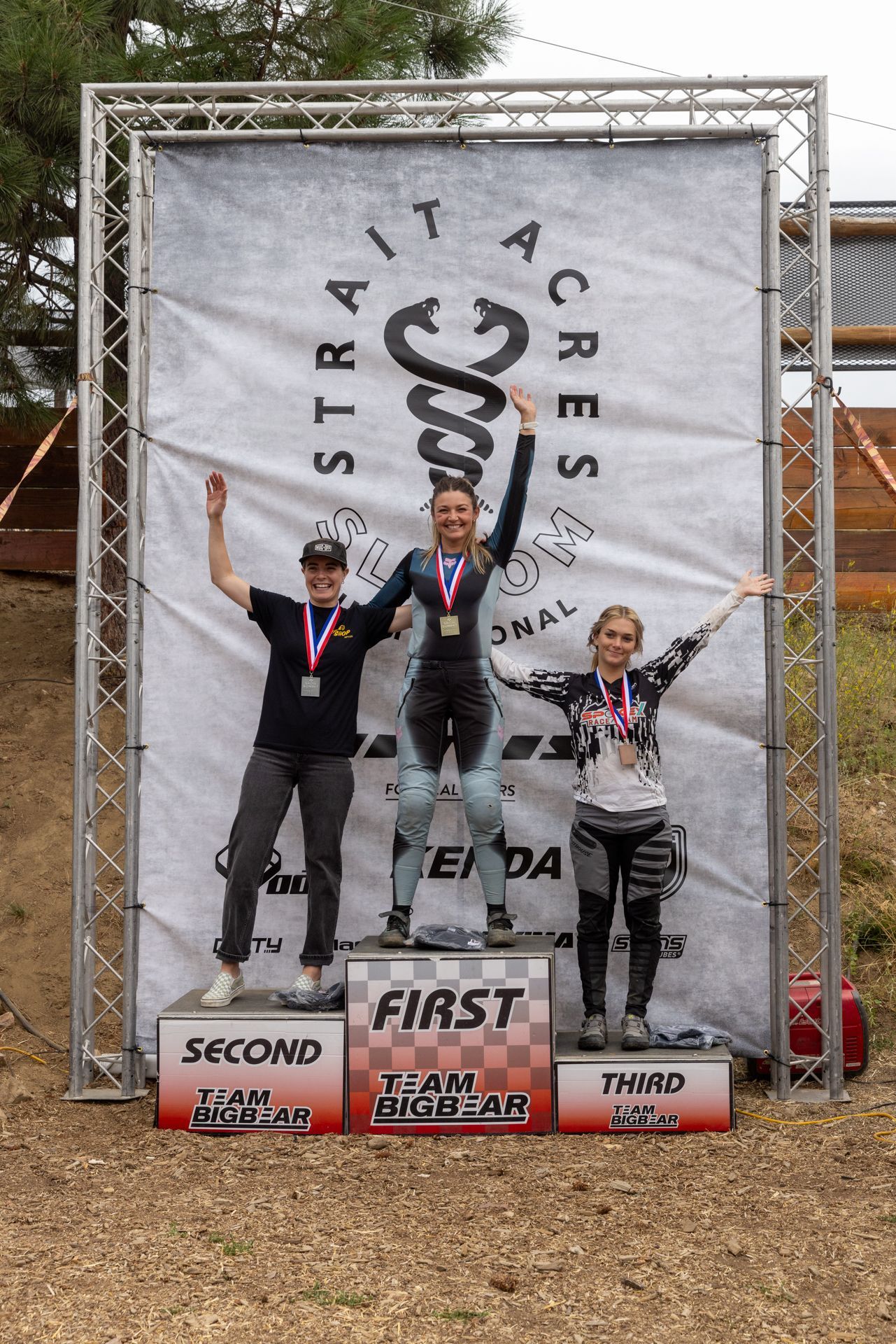 Winners on a podium at a 