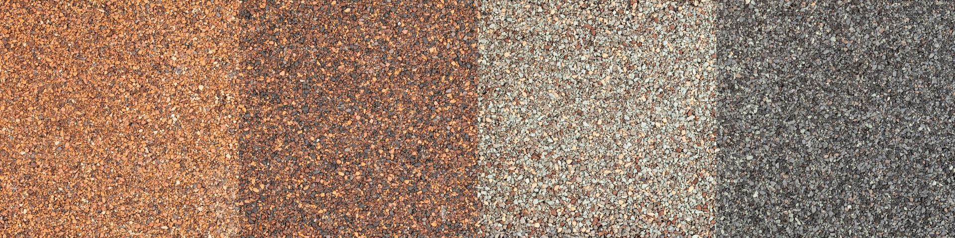 Abstract close-up of multicolored speckled texture, mostly brown, tan, and gray