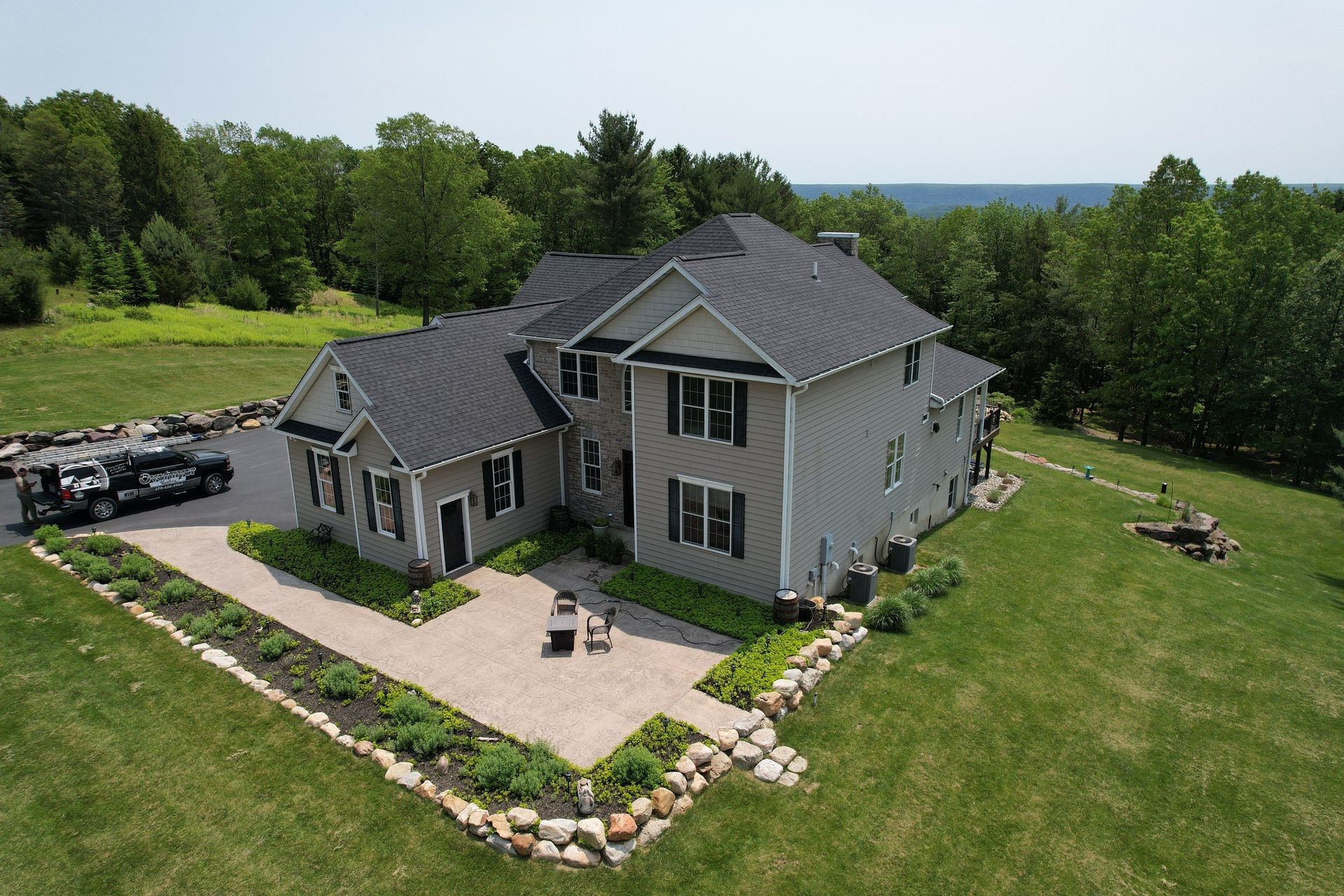 A close up of a gutter on the side of a house