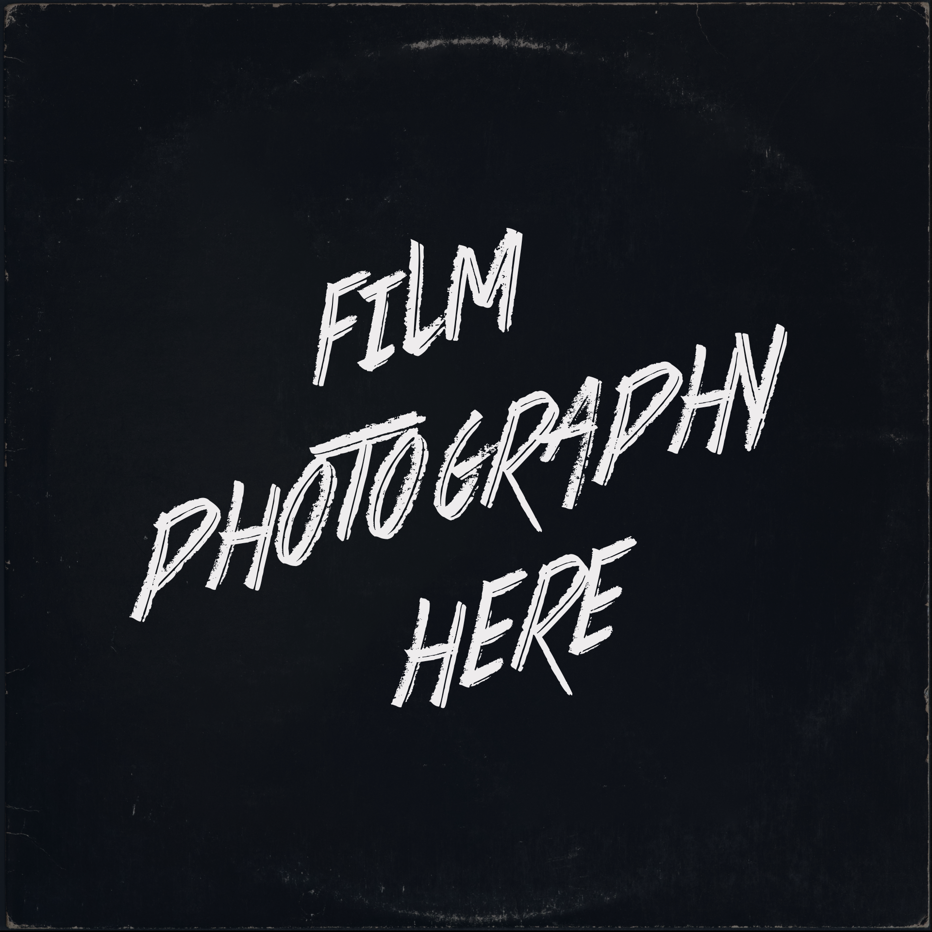 A black background with white writing that says film photography here