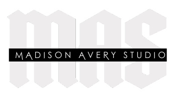 The madison avery studio logo is a black and white logo on a white background.