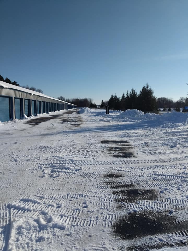 Driveway Clearing — Road with Snow Removed in Minneapolis, MN