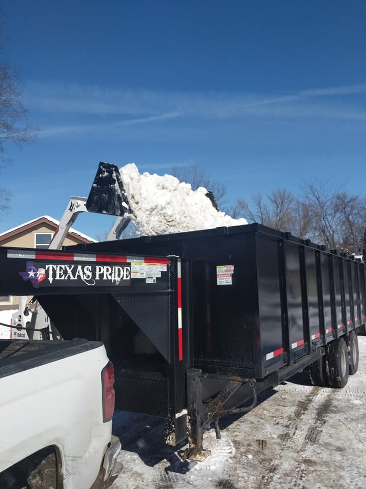 Snow Removal — Loading Lots of Snow on a Truck in Minneapolis, MN