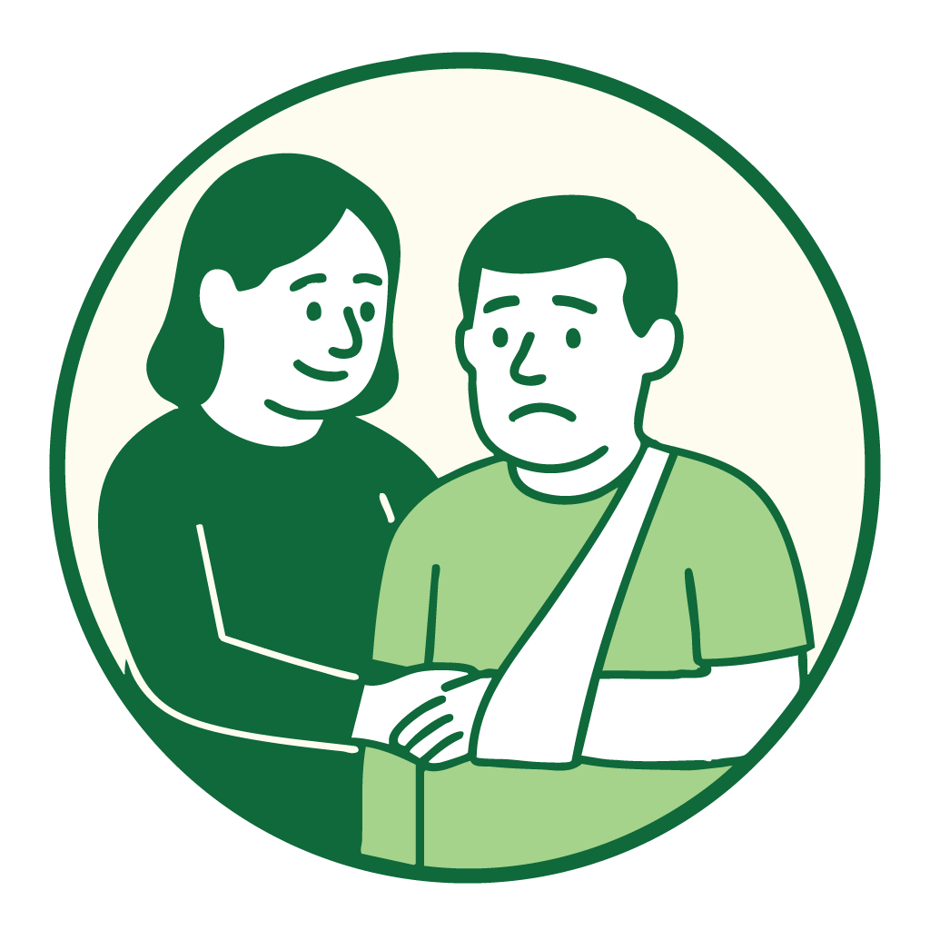 Woman with her arm around a man whose arm is in a sling.