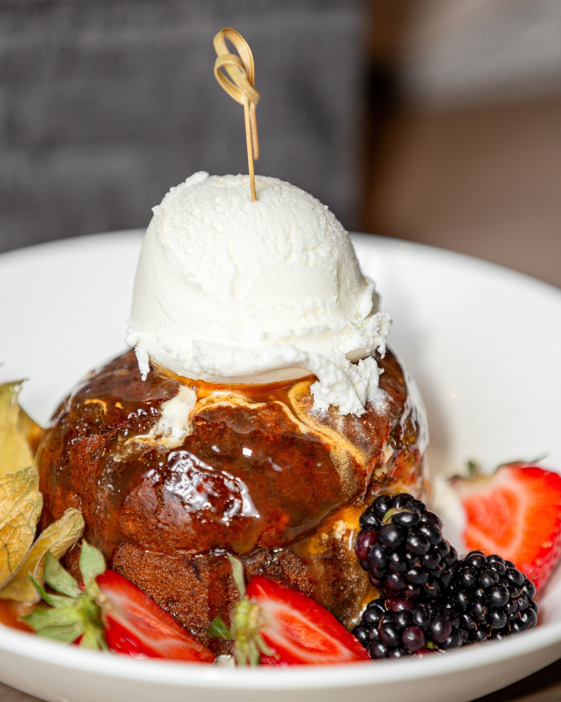 A plate of food with a scoop of ice cream on top