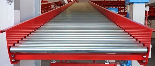A conveyor belt is being used in a warehouse.