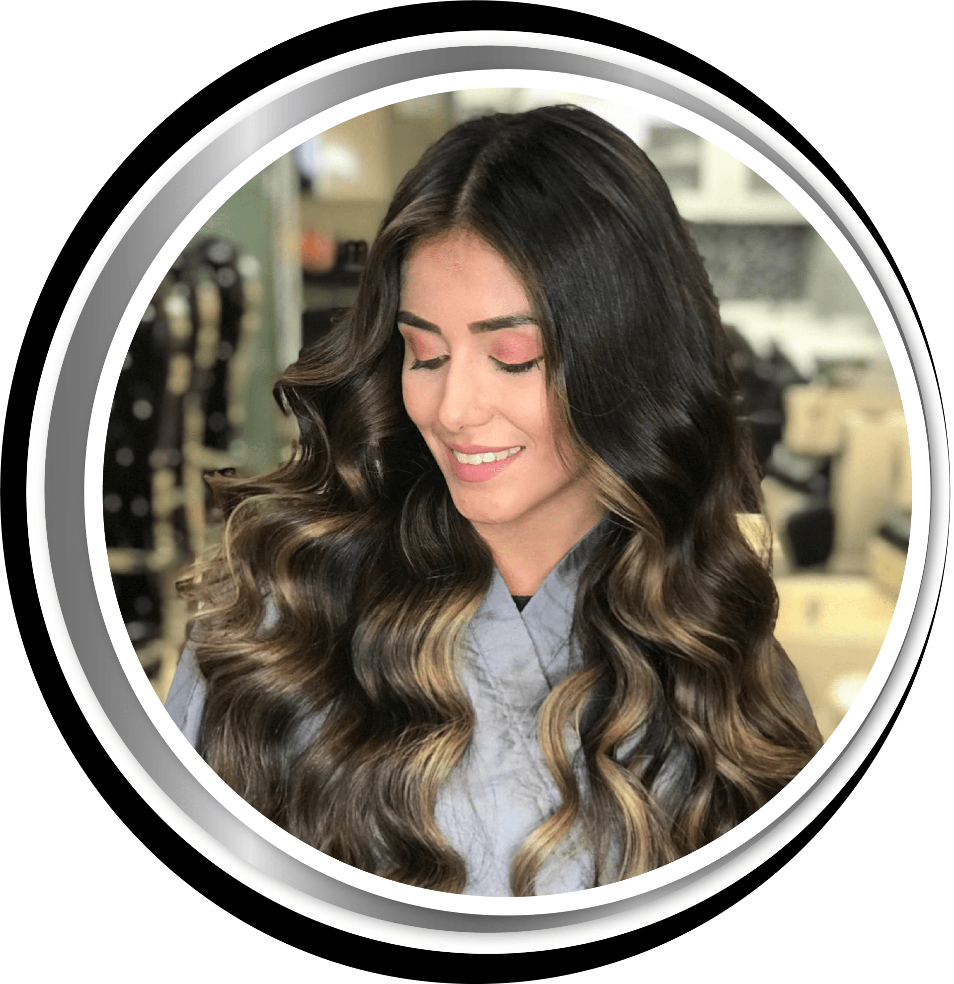 A woman with long wavy hair is smiling in a circle.