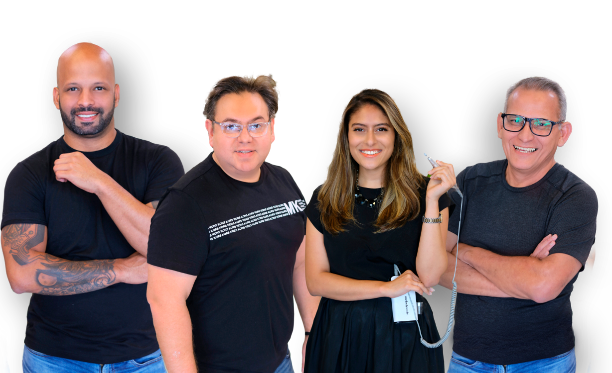 A group of people standing next to each other with their arms crossed.