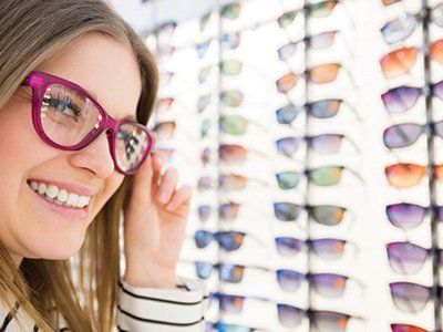 Woman Wearing Pink Glasses - Buy Glasses in Methuen, MA
