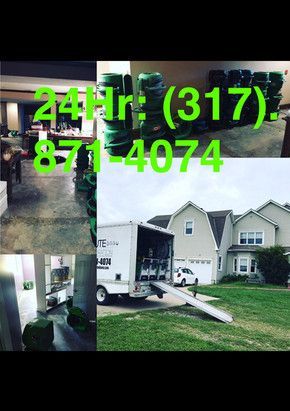 A moving truck is parked in front of a house.