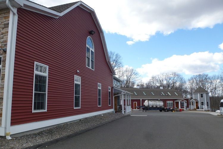 A large red building with a lot of windows