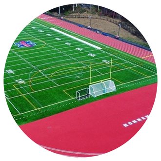 An aerial view of a football field with a running track.