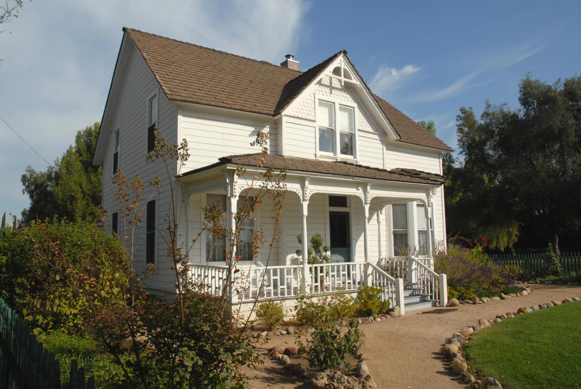 big house with concrete walkway