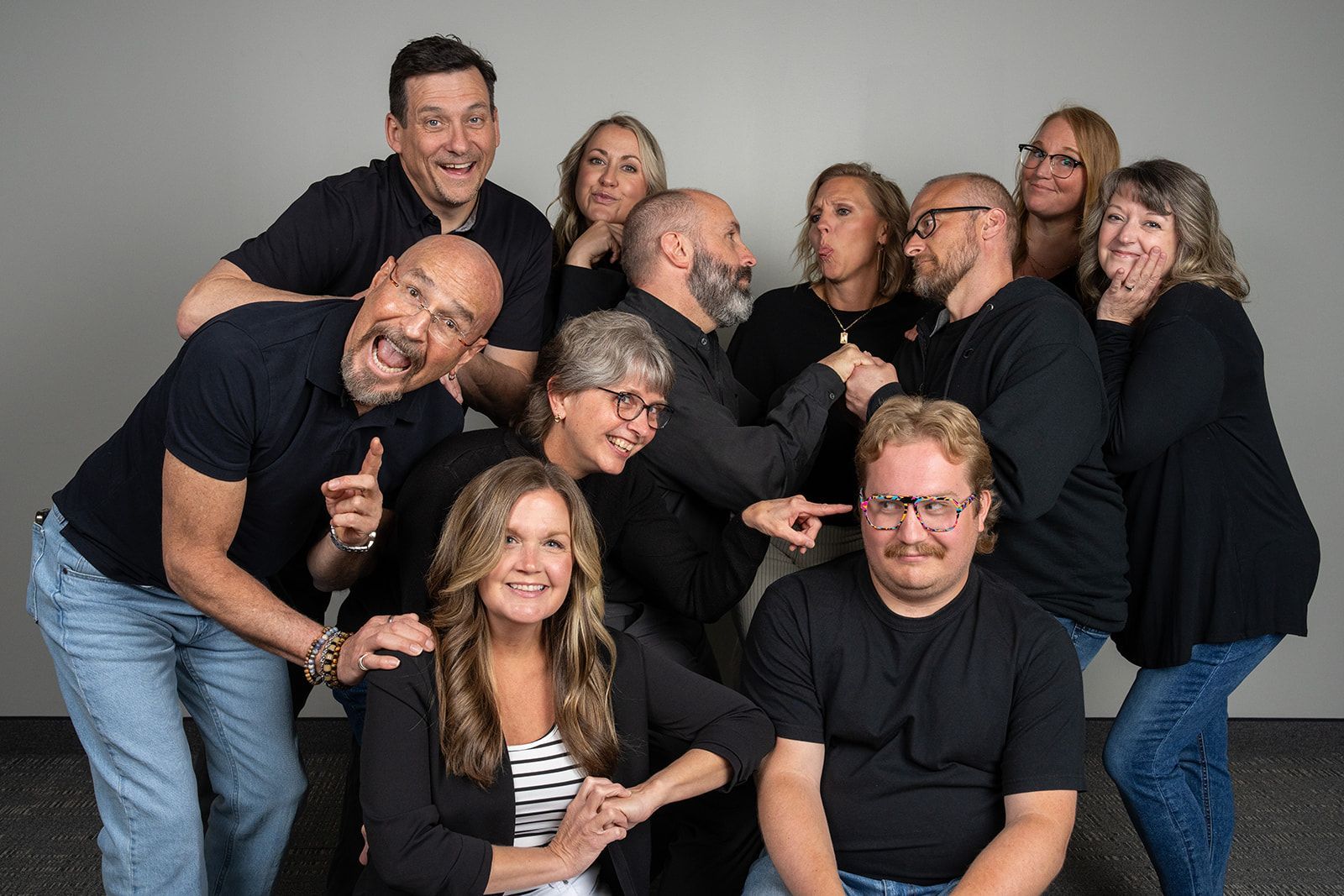 A group of people are posing for a picture together.
