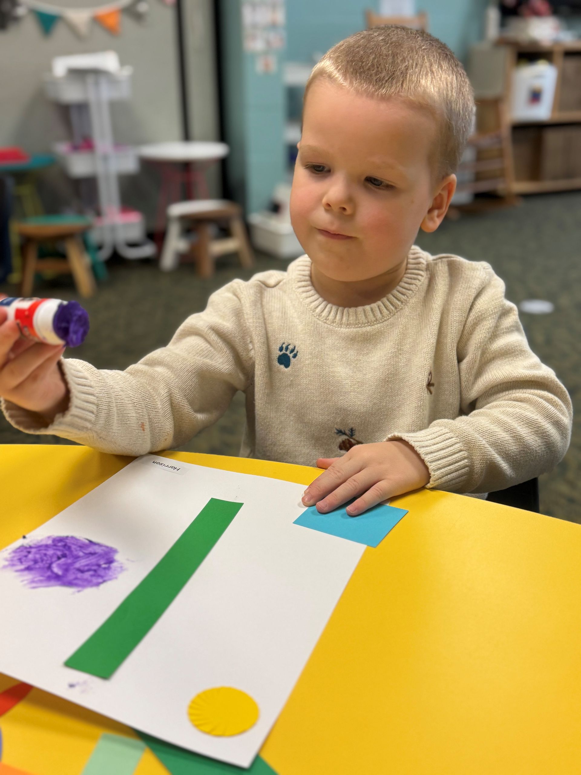 A little girl wearing a blue shirt that says clebration lutheran church