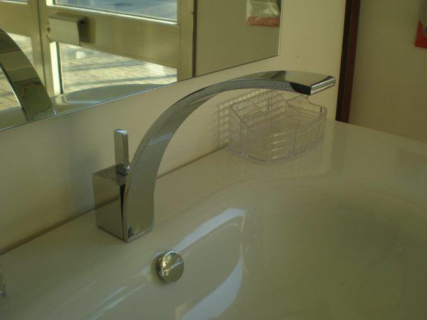 Rubinetto curvilineo