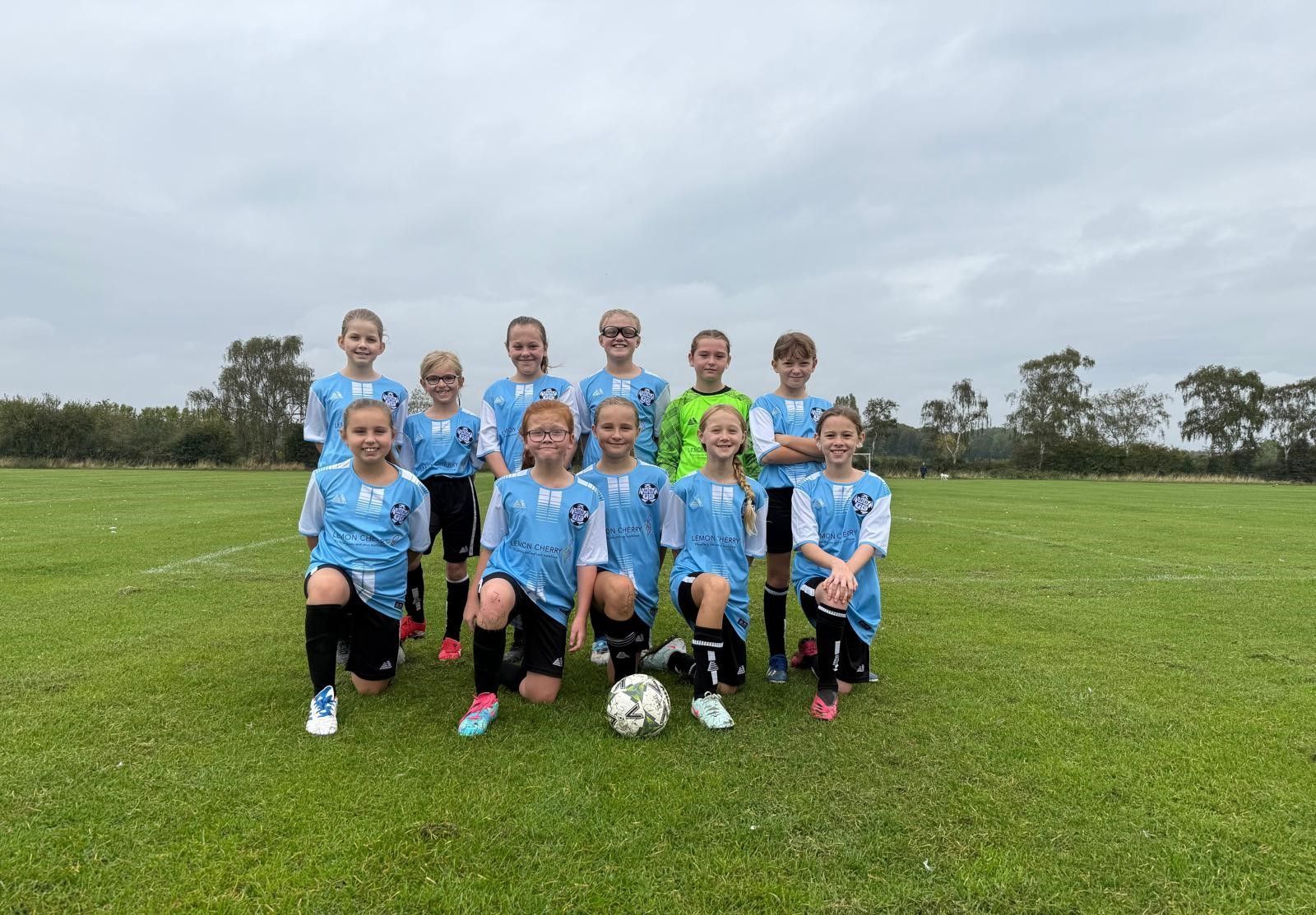 Hessle Rangers U10 girls football team wearing Lemon Cherry sponsored shirts