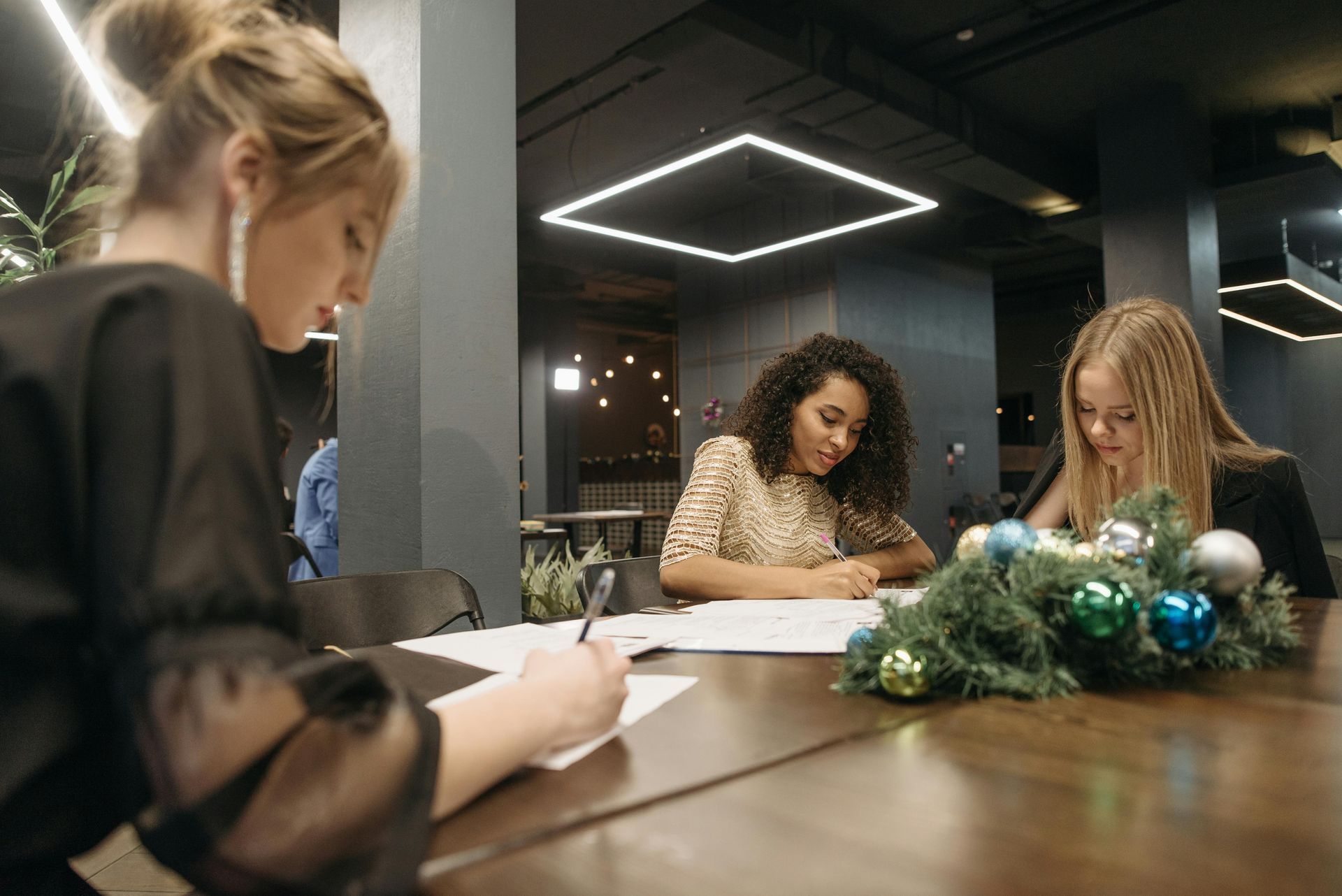 Professional team discussing workplace drug and alcohol policy for Christmas party