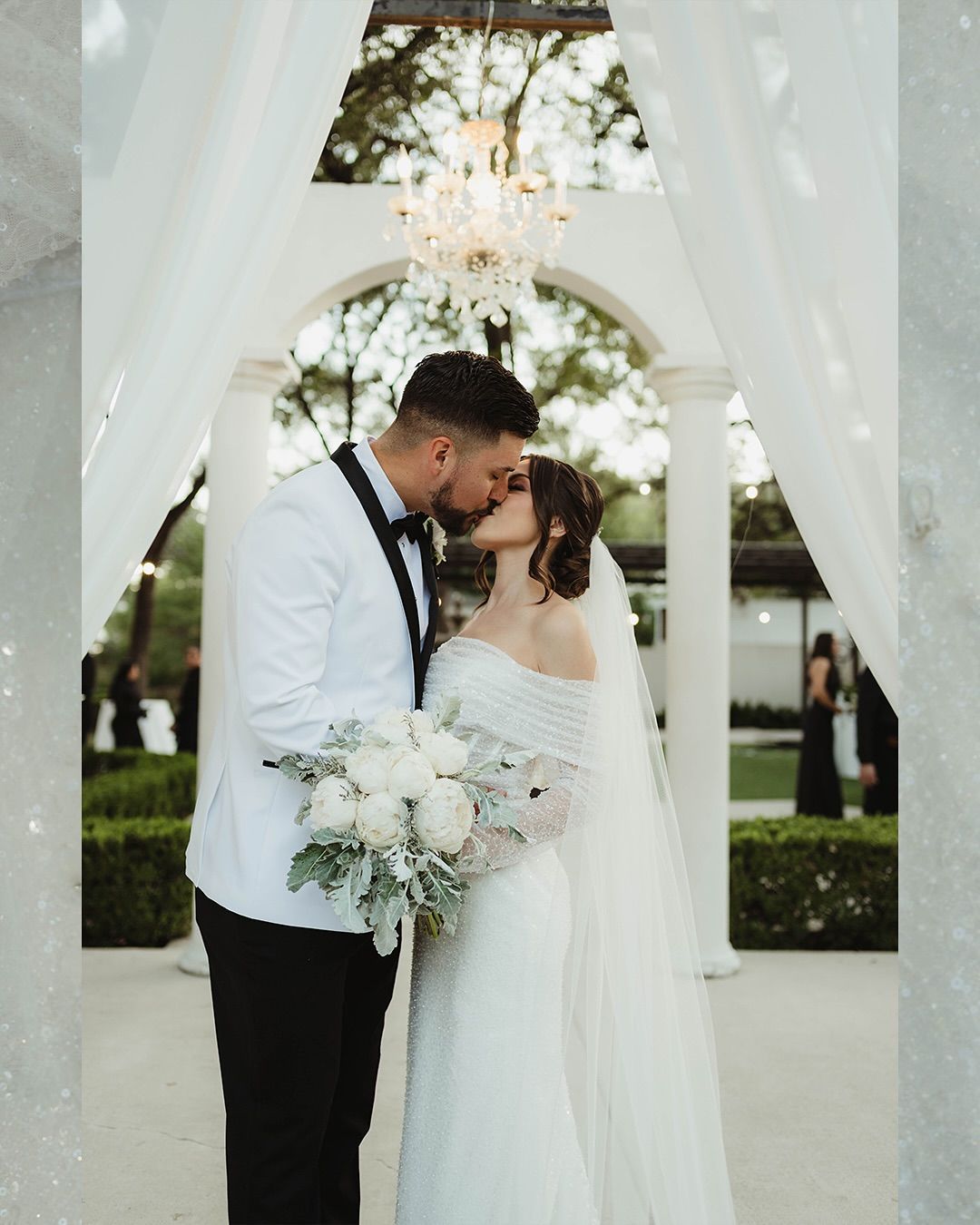 John and Pearl sharing a heartfelt moment during their wedding at The Gardens at West Green