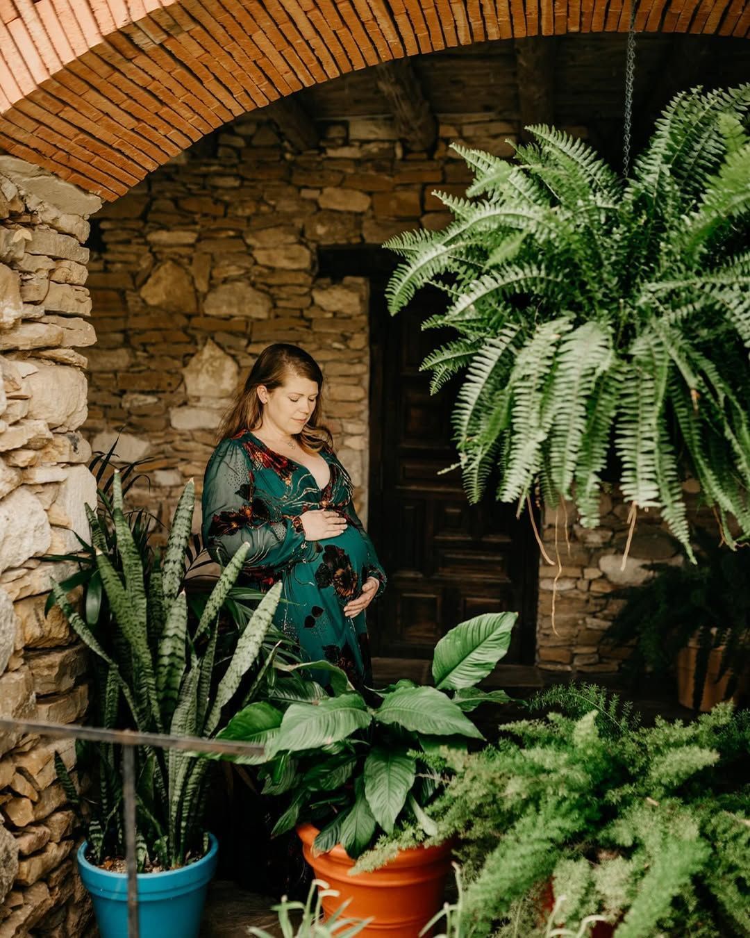 Megan smiling, bathed in soft light at San Antonio Missions