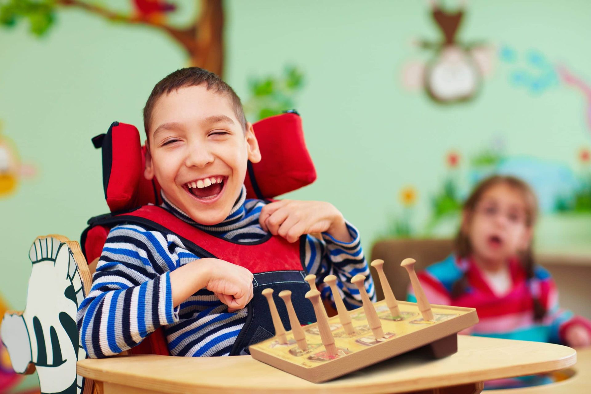 Boy with cerebral palsy smiling