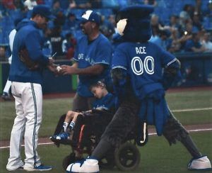 Chid with cerebral palsy at a Blue Jays Game