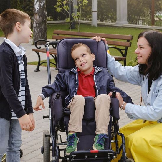 Boy with Cerebral Palsy and his family