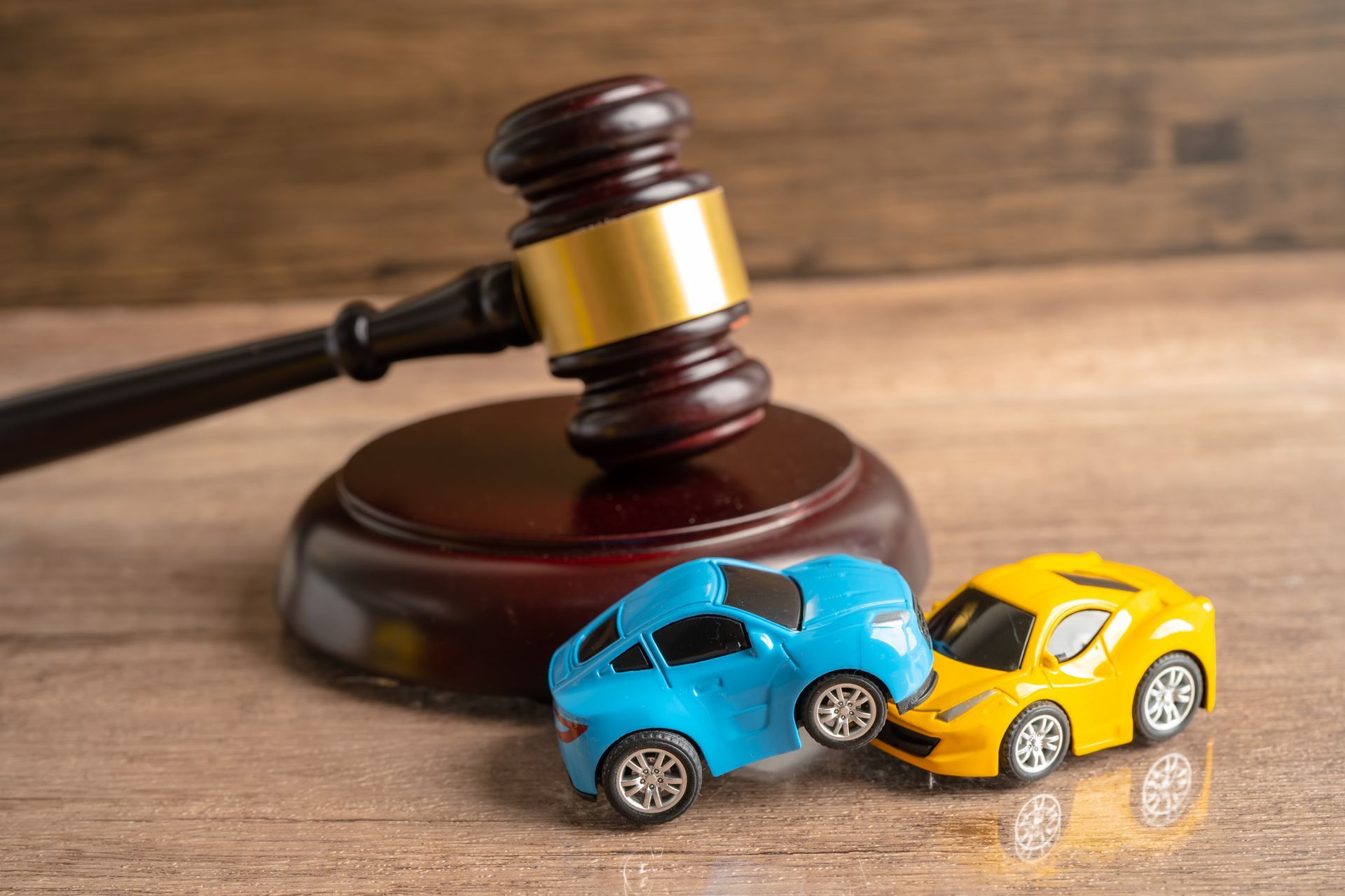 Hammer gavel judge with car vehicle accident. Hammer gavel judge with car vehicle accident.