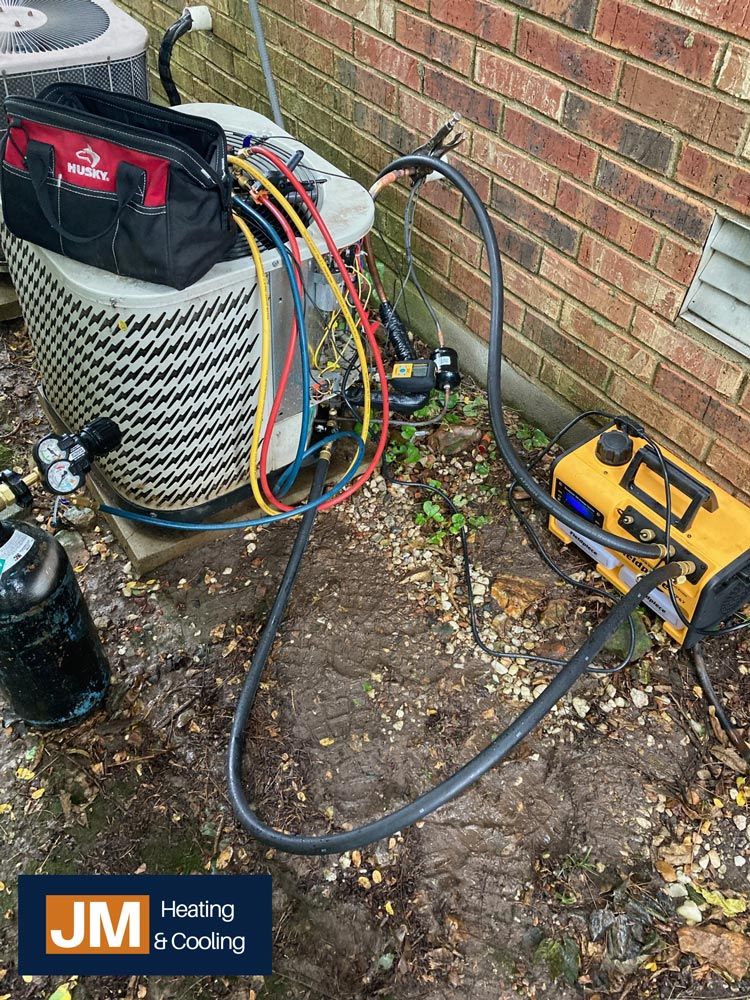 HVAC Units with Gauges and Vacuum Pump — Springfield, MO — JM Heating & Cooling