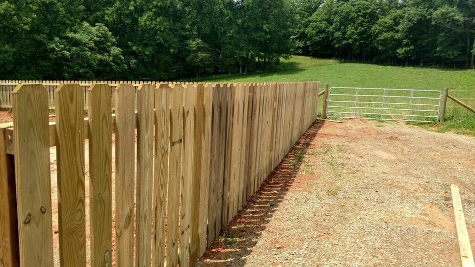 Wood Fence and Metal Gate