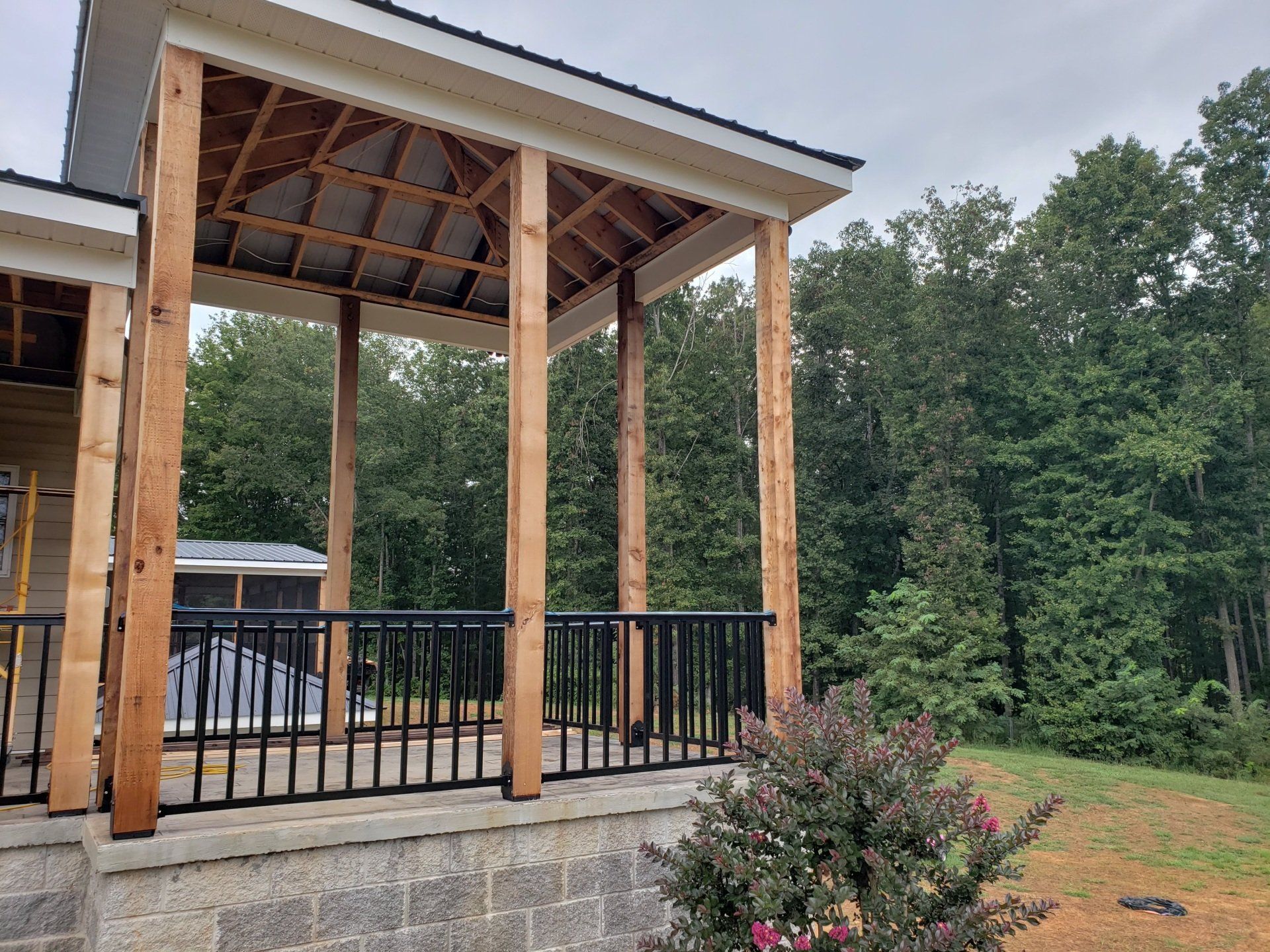 Black Handrails and Shrubs