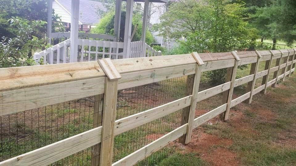 Wood Fence Surrounding Backyard