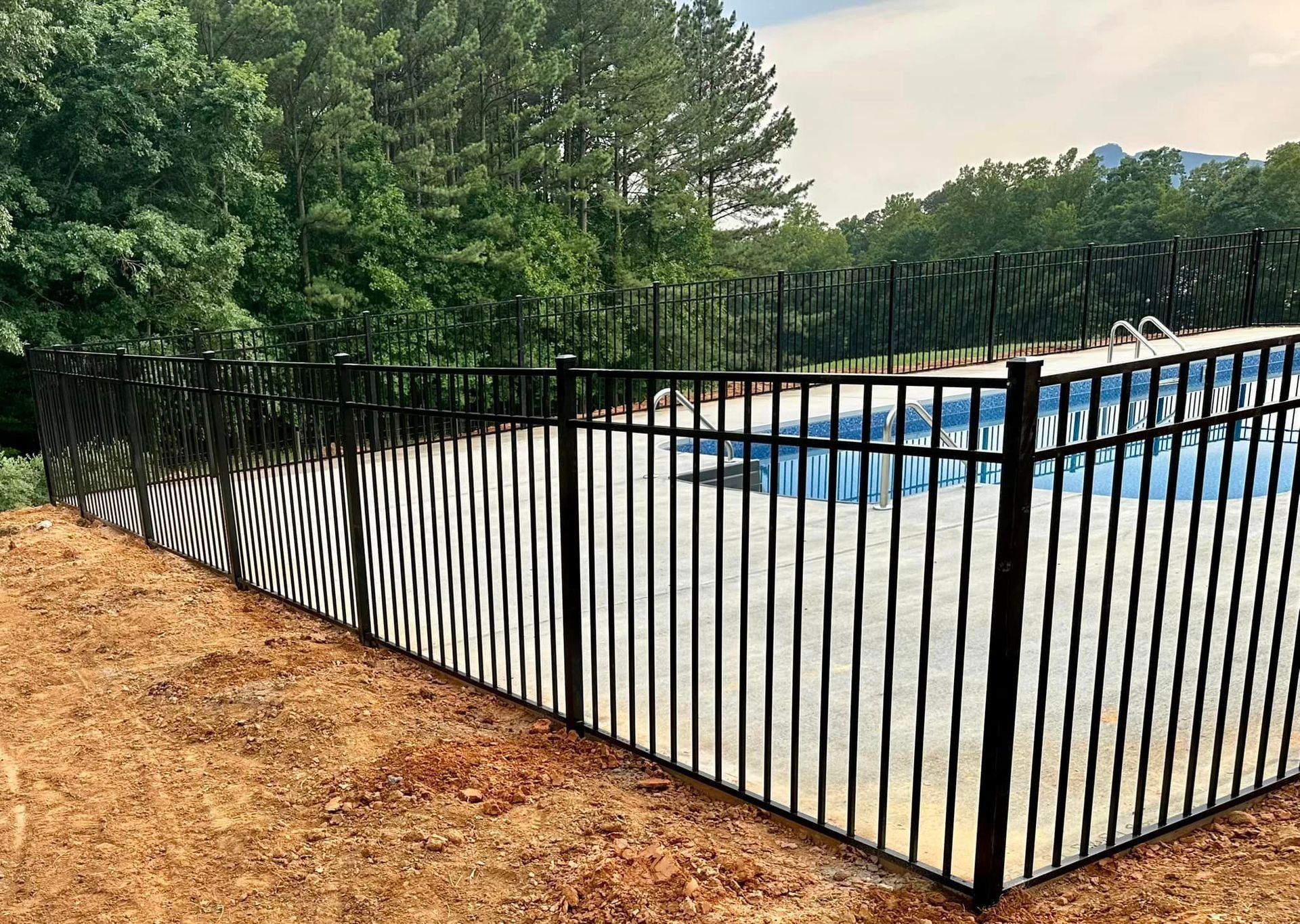 Aluminum fencing around inground swimming pool
