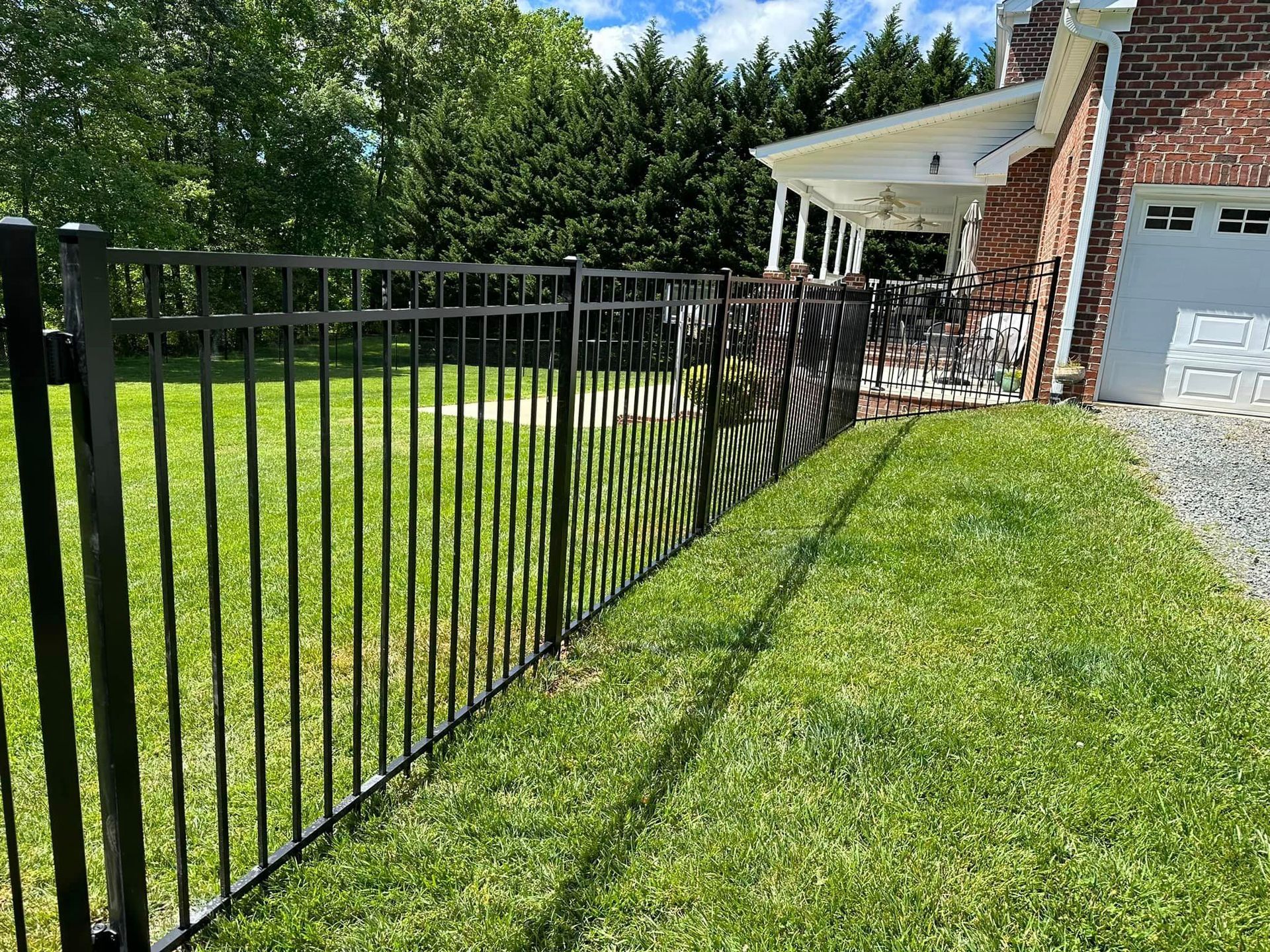 aluminum fence along driveway