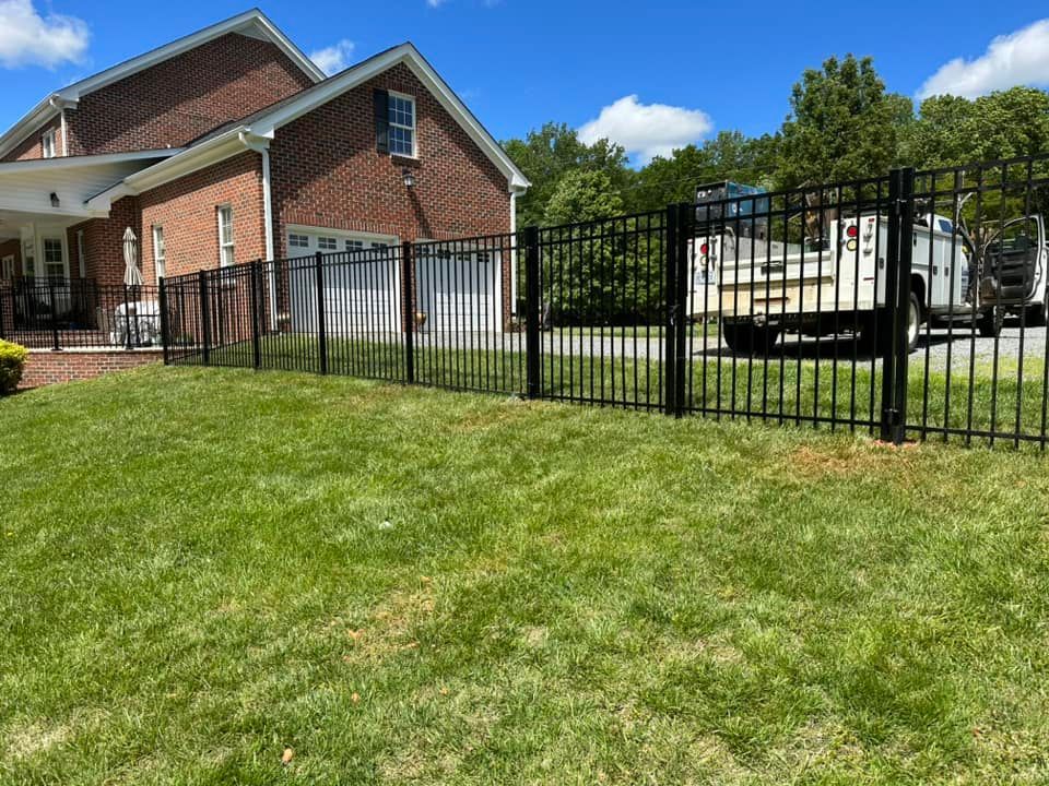 aluminum fence near driveway