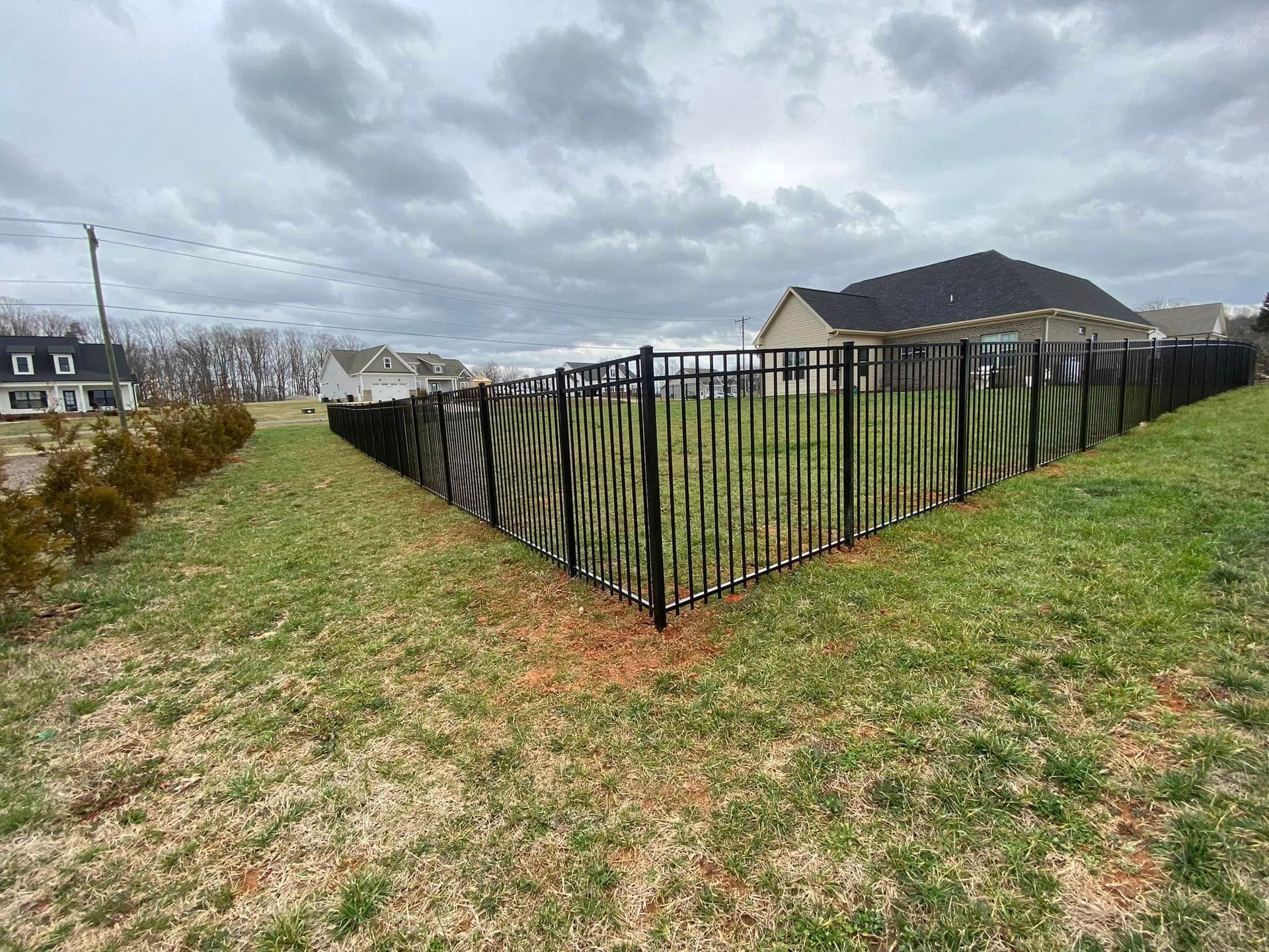 Aluminum fence around backyard in new development