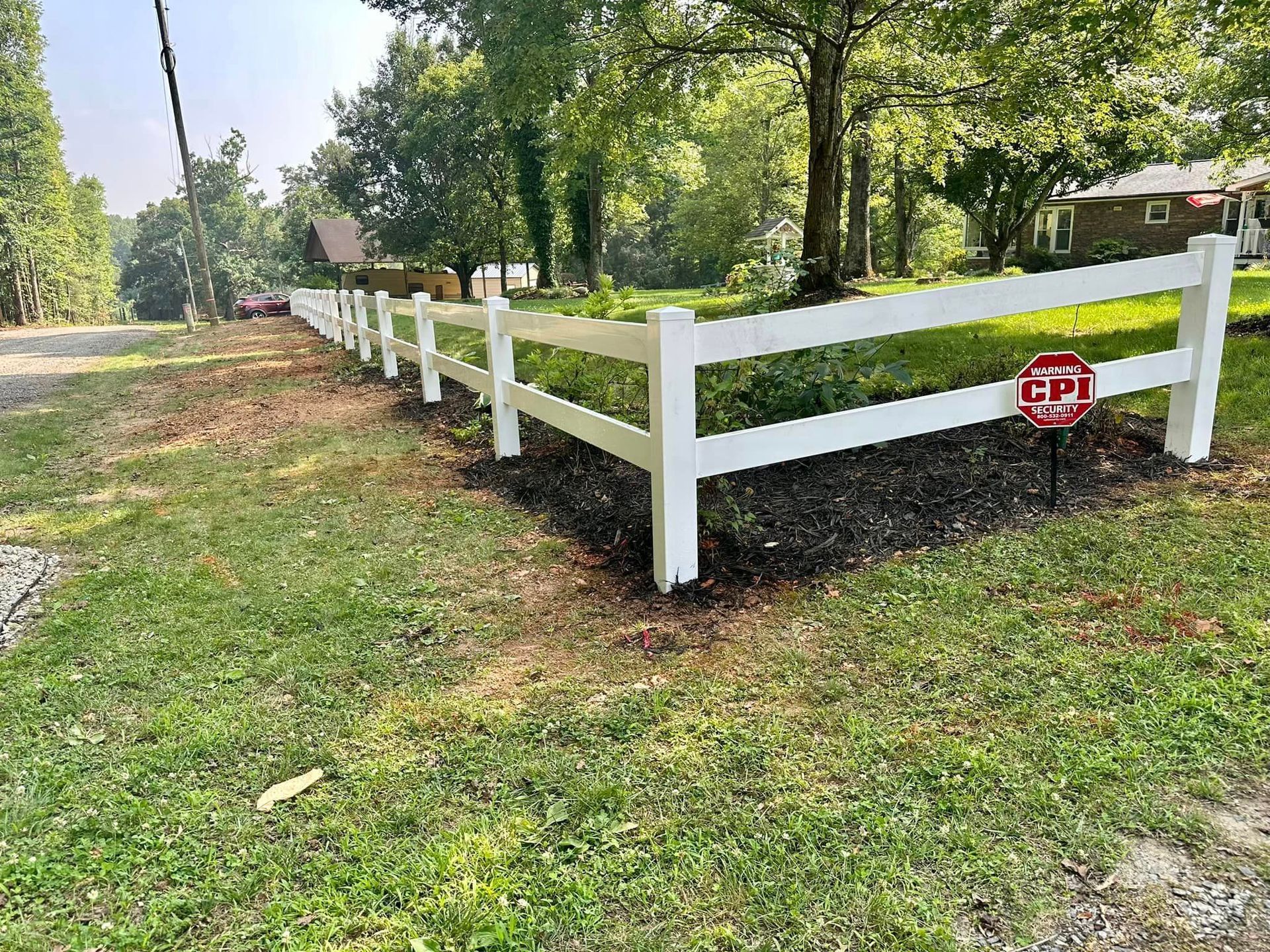 vinyl fencing along front of property