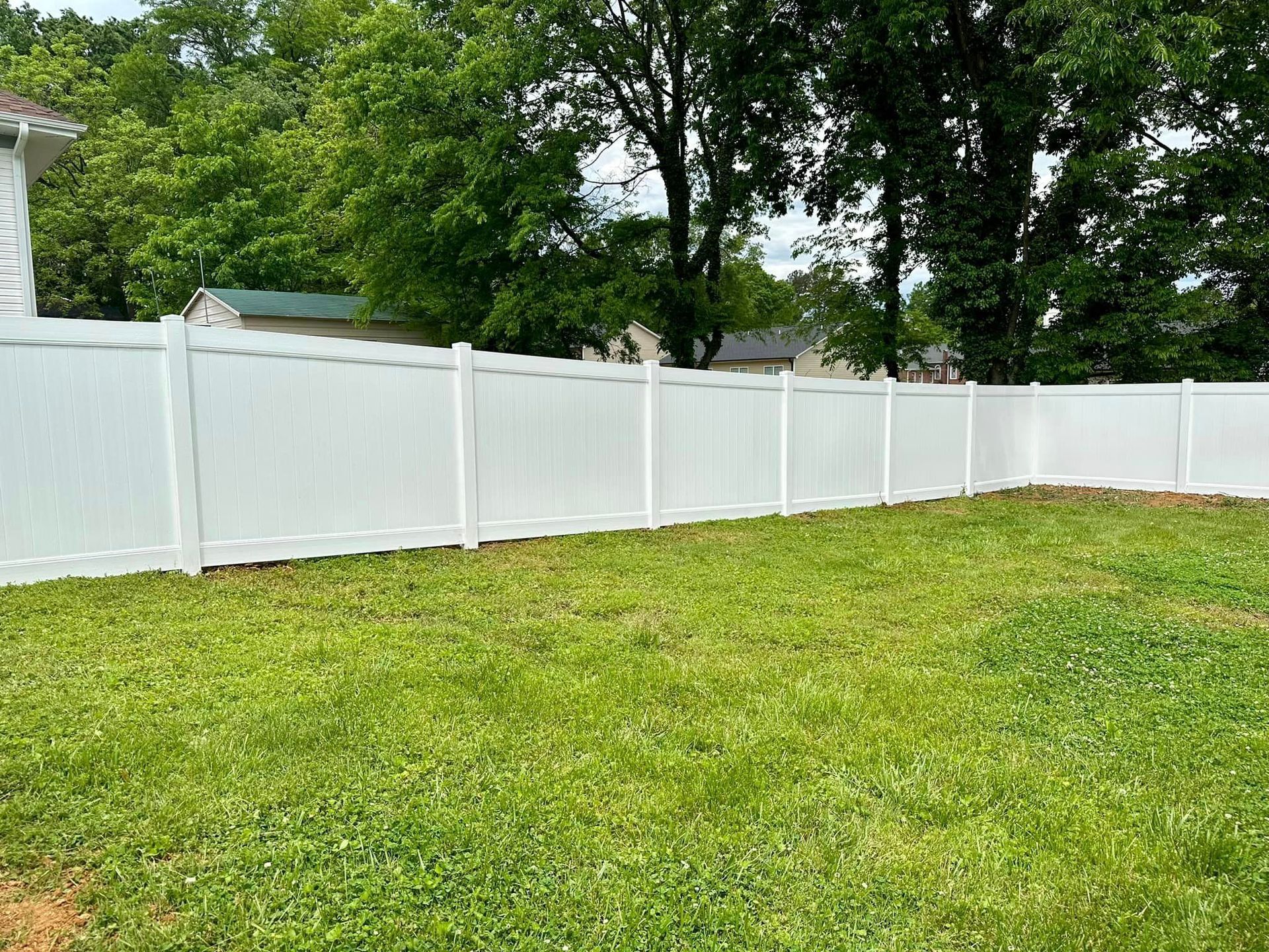 tall vinyl fencing on residential property