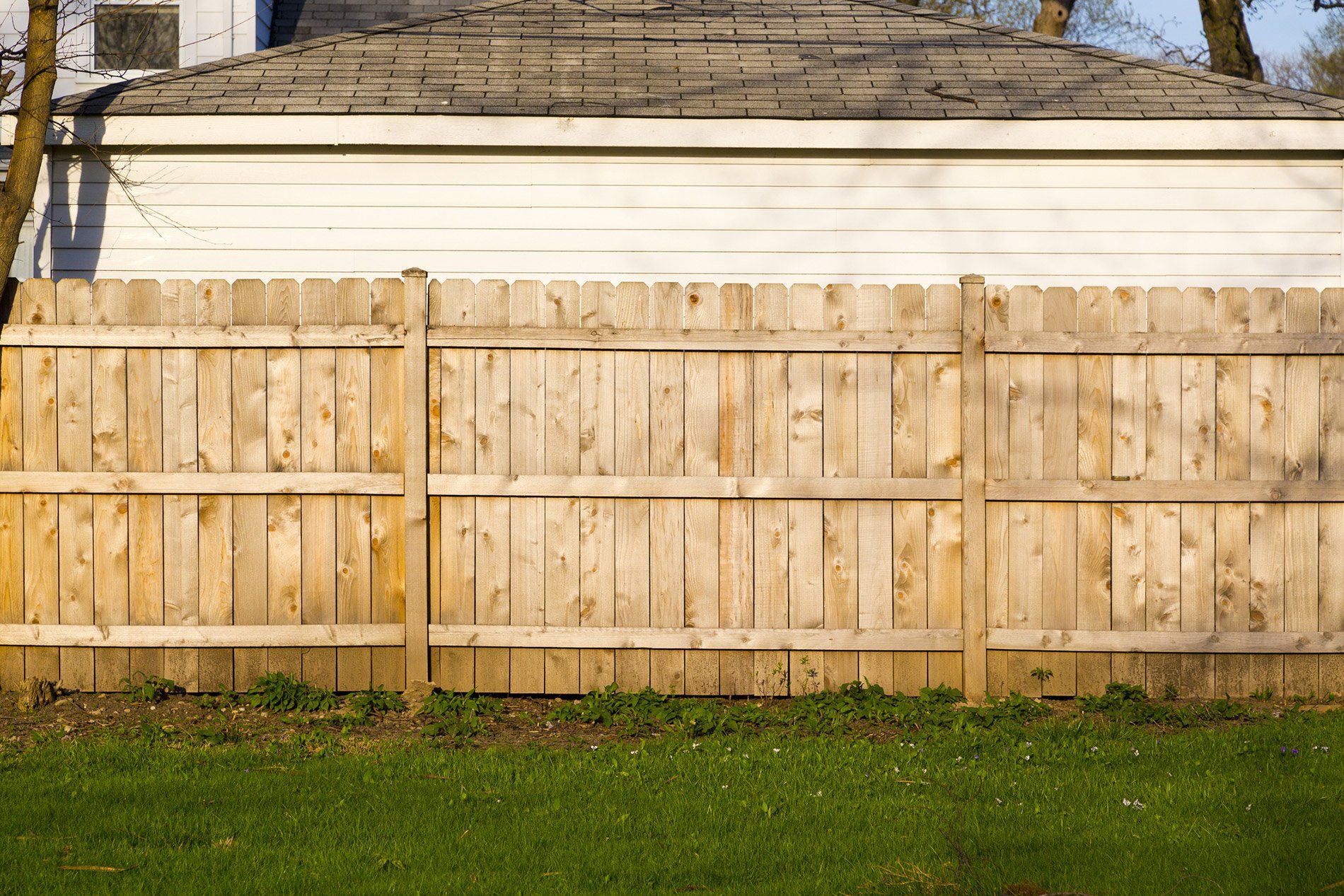 Stained Wood Fence on Residential Property
